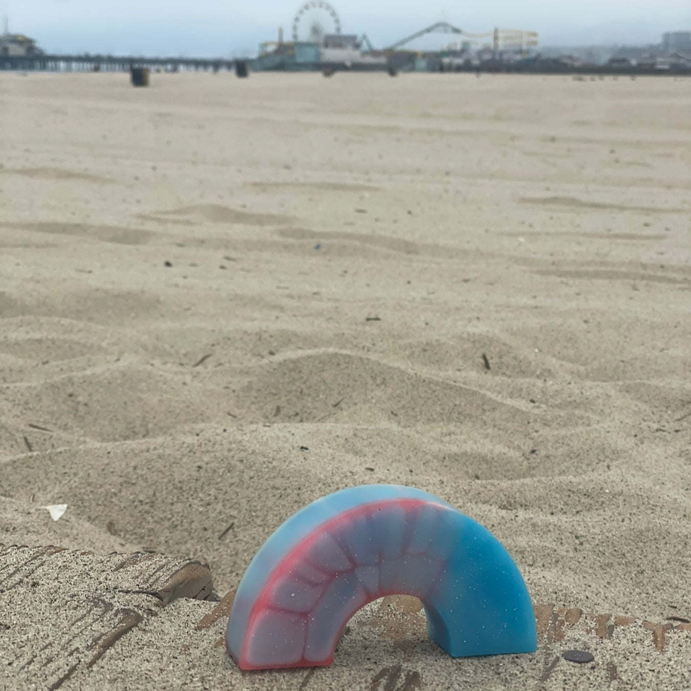 a resin rainbow on the santa monica beach